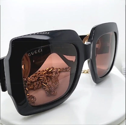 Gucci Moissanite Sunglasses with a dainty Cuban two tones chain 