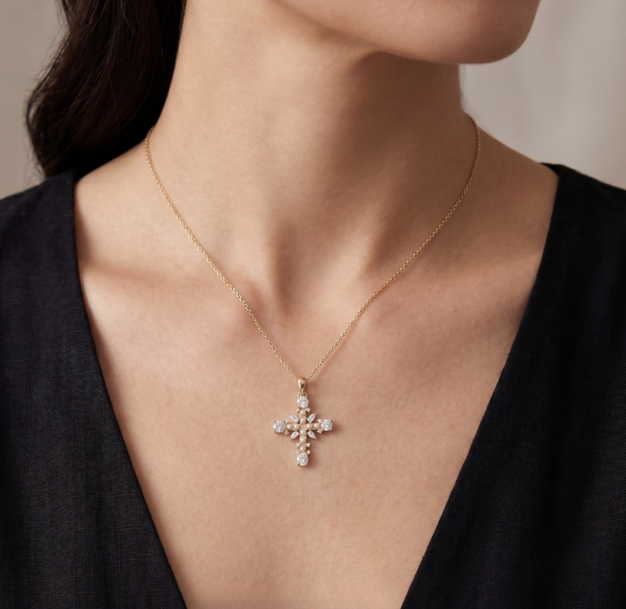 Pearl Cross Charm in 925 sterling silver with moissanite or CZ, worn on model